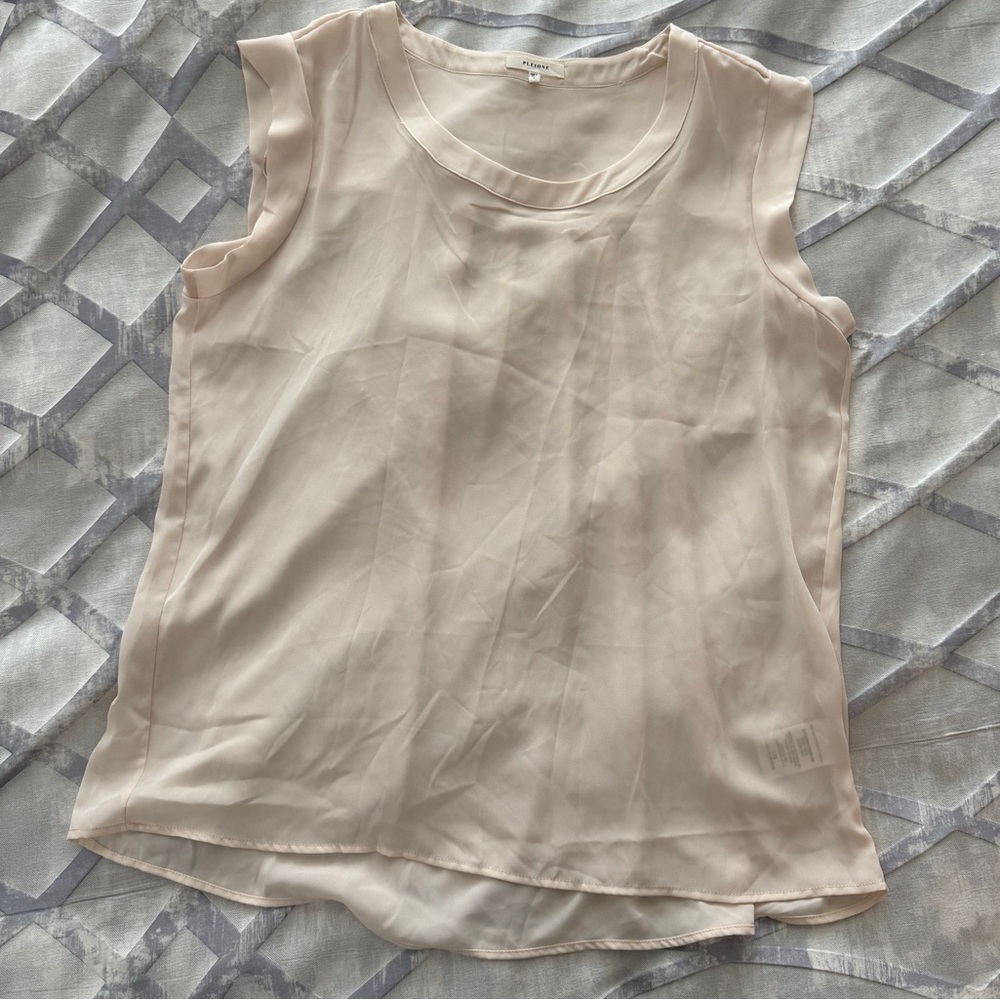 Like new Pleione cream blouse with pleated back.  Size Large.